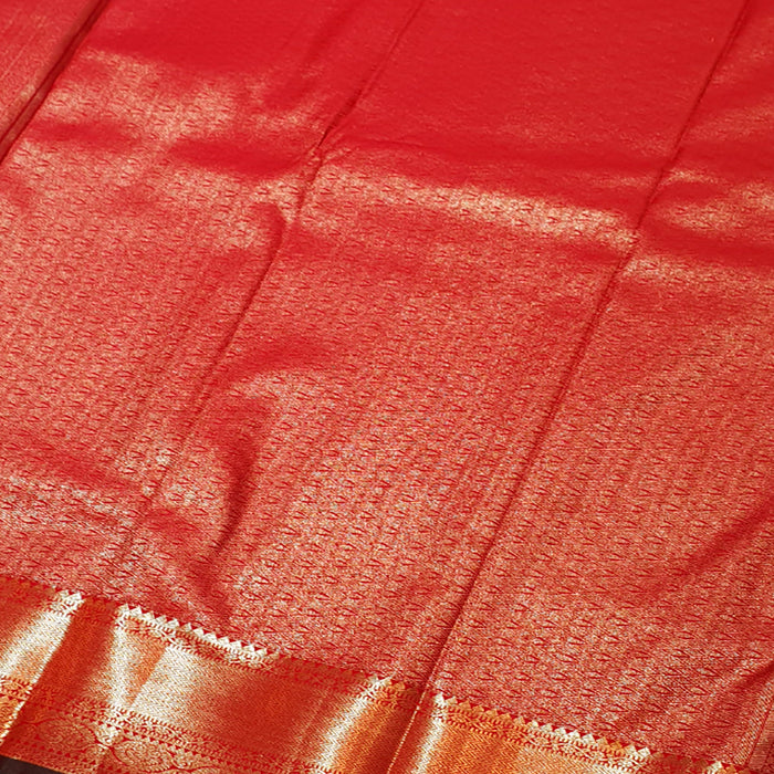 red and gold silk saree